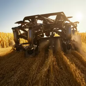How do rotary corn headers prevent clogging and residue buildup?